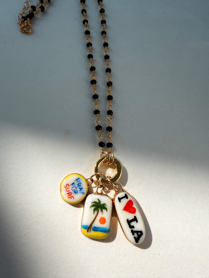 Pray for Surf — Hand-Painted Porcelain Charm